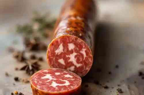 Saucisson Sec De Canard recipe served on a plate, by Pekin the Chef